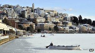 Boat trapped in ice on Greek lake