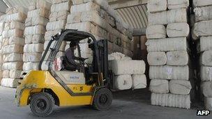 Bales of cotton for export are stacked at Inland Container Depot (ICD) in Sanand, some 30 kms from Ahmedabad, Gujarat state, India - 10 February 2012