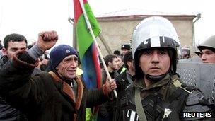 A protester shouts at riot police in Quba, Azerbaijan 1 March