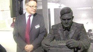 Sir John Dermot Turing and statue of Alan Turing