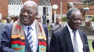 Former Zambian president Rupiah Banda and current President Michael Sata
