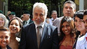 Prime Minister Xanana Gusmao (C) chats with East Timorese students after the 70th anniversary commemoration of the Battle of Timor in Sydney on February 19, 2012