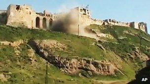 Still from activists' video purporting to show castle at Qalaat al-Mandiq being shelled (21 March)