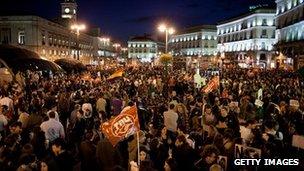 Demonstrators crowd Cibeles Square during a general strike in March 2012 in Madrid.