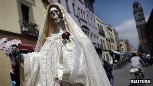 A statue of "Saint Death" is seen in Mexico City March 7, 2012.