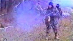 A Chechen fires a machine gun