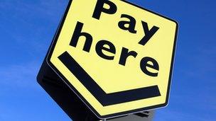 Pay here sign