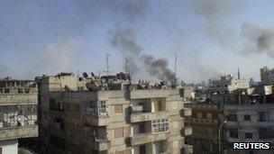 Smoke rises from the al-Qusoor district of Homs 8 April, 2012.