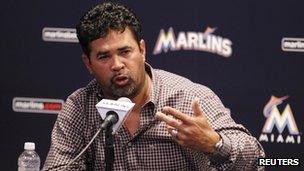 Ozzie Guillen speaks at a news conference in Miami, Florida (April 10, 2012)