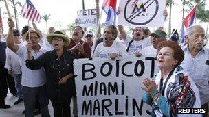 People demonstrate outside Marlins Park in Miami, Florida (April 10, 2012)
