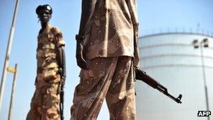 Soldiers guard an oil field in South Sudan