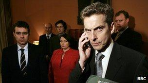 The character of Malcolm Tucker, played by actor Peter Capaldi, in BBC drama The Thick of It, with supporting cast in the background