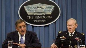 Leon Panetta and General Martin Dempsey speak to reporters on 16 April 2012