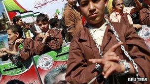 Children rally in Gaza City in solidarity with Palestinians held in Israeli jails