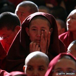 Exiled Tibetan monks attend the funeral ceremony of Jamphel Yeshi