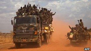 South Sudan vehicles drive on the road from Bent to Heglig, 17 April 2012