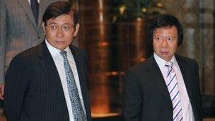 Chairmen and Managing Directors of Sun Hung Kai Properties Raymond Kwok (L) and Thomas Kwok (R)