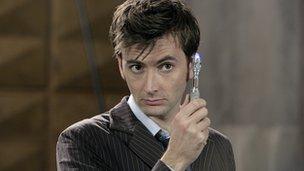David Tennant as Doctor Who holding sonic screwdriver
