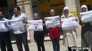 Journalists at Gerasa News protest against the detention of their colleagues