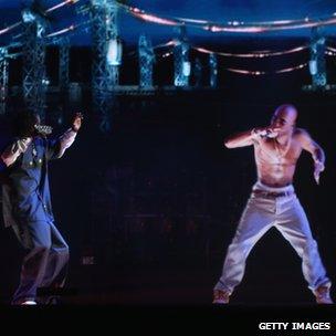 Hologram of deceased rapper Tupac Shakur (right) on stage with Snoop Dogg, 15 Apr 12