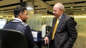 Immigration Minister Damian Green on a visit to Terminal 3 of Heathrow Airport