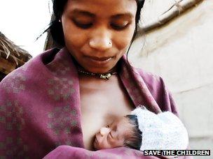 Baby in mother's arms in Nepal