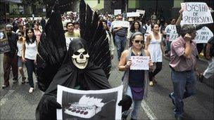 Protesters march against the killing of Mexican journalists Regina Martinez in Xalapa, Veracruz state, 29 April.
