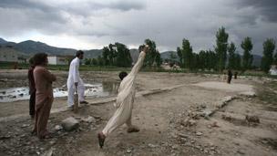 Cricket on the site of the demolished Bin Laden compound