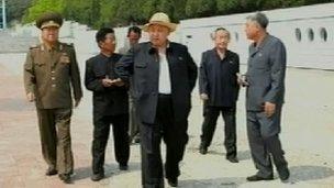Mr Kim appeared relaxed amongst officials (Source: North Korean TV)