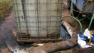 One of the oil containers at the site
