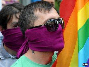 Gay rights activists with a rainbow flag in Tbilisi, 17 May