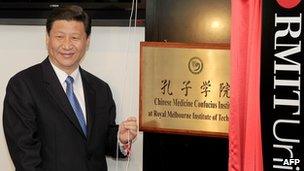 Chinese Vice President Xi Jinping unveils the plaque at the opening of Confucius Institute at the RMIT University in Melbourne, Australia, 20 June 2010