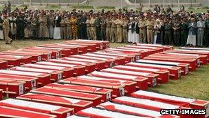 The coffins of 96 soldiers who were killed in a suicide bombing in Sanaa, Yemen