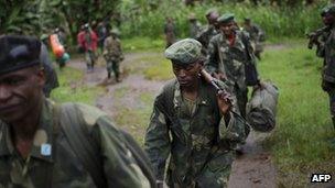 Soldiers from the Armed Forces of the Democratic Republic of the Congo (FARDC) near the village of Kinyamahura, in North Kivu province on May 17, 2012