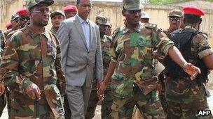 President Sheikh Sharif Sheikh Ahmed surrounded by soldiers - 29 May 2012