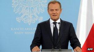 Poland's Prime Minister Donald Tusk addresses reporters in Warsaw after President Barack Obama called Nazi death camps set up in occupied Poland during World War II "Polish".