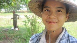 Woman subsistence farmer in hat
