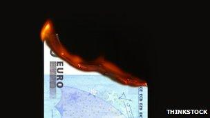 Burning euro notes