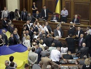 Party of the Regions MPs surround the speaker's tribune in the Ukrainian parliament, 5 June
