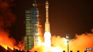 China's Long March 2F rocket carrying the Tiangong-1 module blasts off from the Jiuquan launch centre on September 29 2011