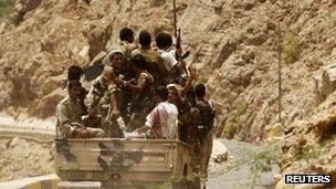 File image of soldiers riding in a military truck in Abyan