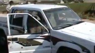 Screengrab from video purportedly showing killings in Darat Izza (22 June 2012)