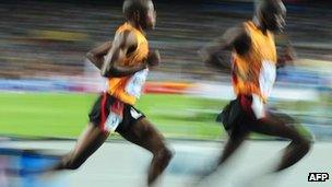 Uganda's Jacob Araptany and Uganda's Benjamin Kiplagat compete during the men's 3,000m steeplechase final at World Championships in Daegu on 1 September 2011