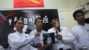 Burmese pro-democracy activists show picture of Phyo Phyo Aung, one of student leaders arrested in recent days - 7 July