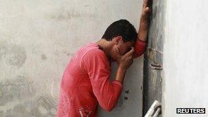 A Palestinian mourns the death of a Hamas militant in Gaza City (12/07/12)