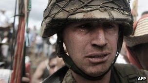 A soldier leaves the base with tears in his eyes