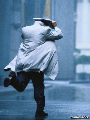 Man running in rain