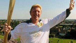 Former Wimbledon winner Boris Becker held the torch aloft at Northala Park in Northolt before the flame made its way to Ealing
