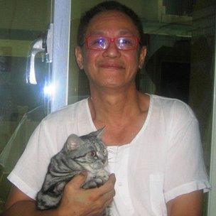 John Lin and his cat