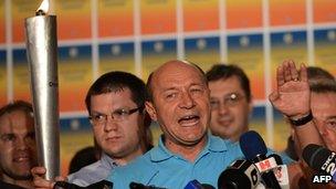 Romanian President Traian Basescu addresses reporters after the referendum. 29 July 2012